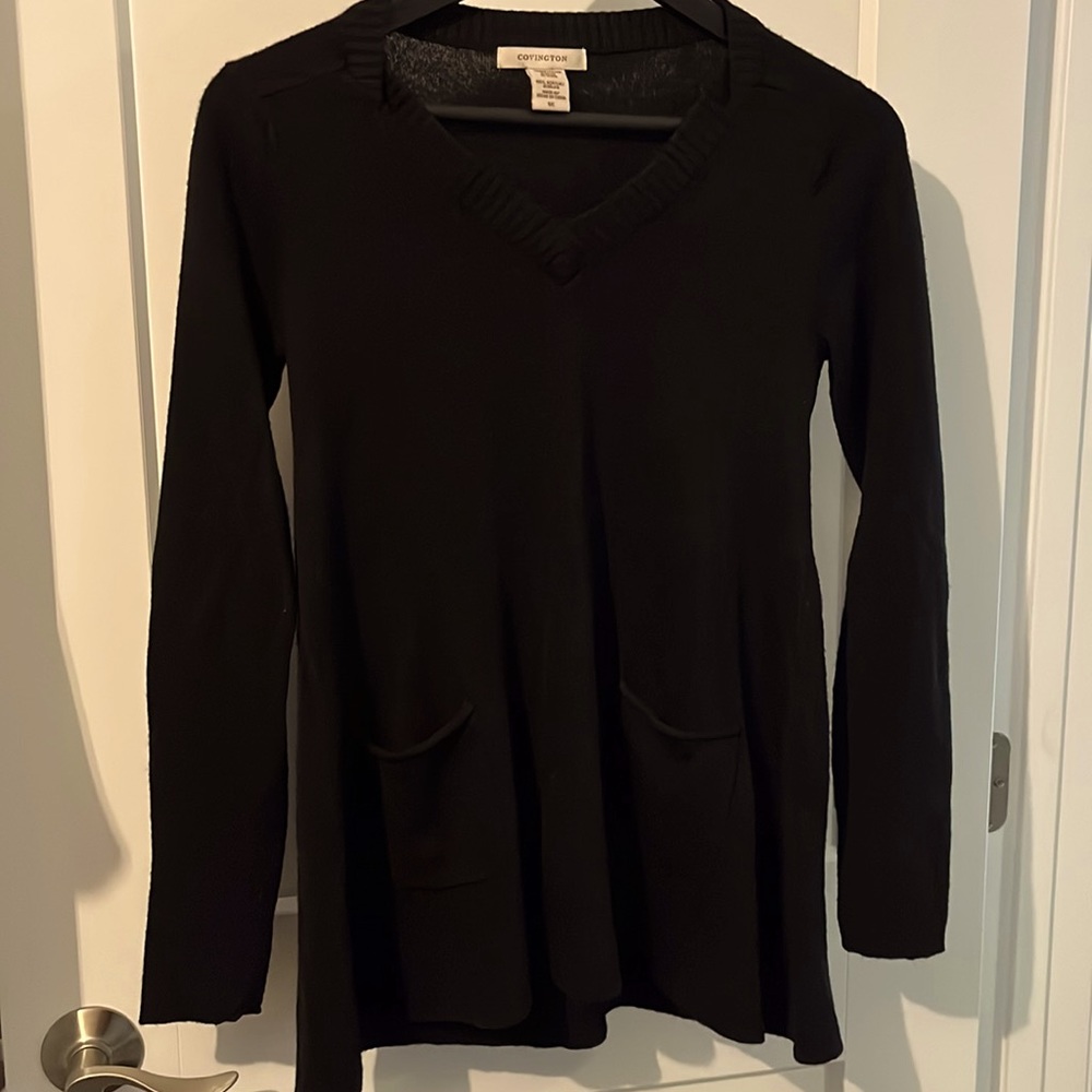 Small, black, Covington sweater.